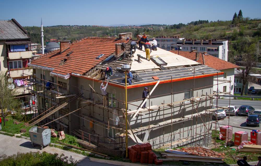 Some residents has been watching their homes slowly deteriorating for the past fifty years.  For the first time in its history this apartment block is being renovated.