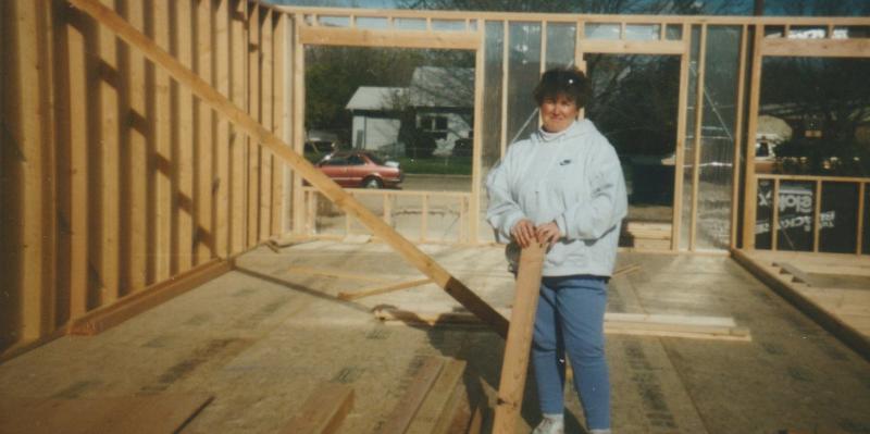 Cathy on the build site of her home in 1995.