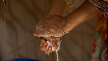 washing hands with soap.