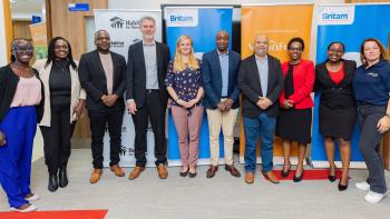 Group photo of Britam, VisionFund Kenya, Habitat for Humanity at the partnership signing