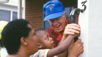 President Carter and a homeowner