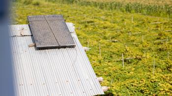 A solar panel on a roof.