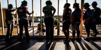 Women Build volunteers raising a wall