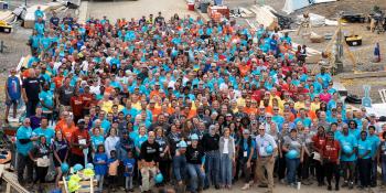 Group photo of volunteers with President and Mrs. Carter.