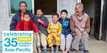 The Liu family in front of their Habitat home in Guangdong, southern China.