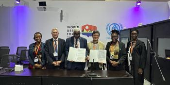 Habitat for Humanity staff pictured with UCLGA during the signing of the partnership agreement