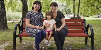 ukrainian women sitting on the bench in Poland