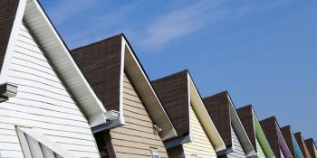 row of colorful houses and blue sky