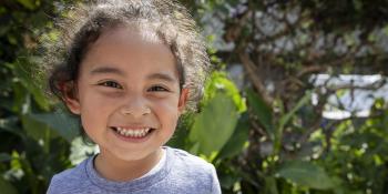 Close up of smiling young girl.