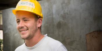 Man in hard hat smiling