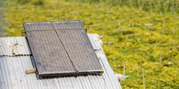 Small solar panel on a tin roof