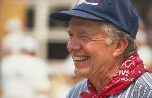 A close-up of President Carter smiling.