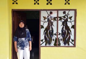 Nurhayati at her home in Indonesia's West Java province