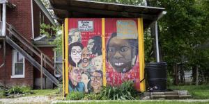 Mural about diversity on a community building.