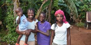 Princile and three of her children in Haiti