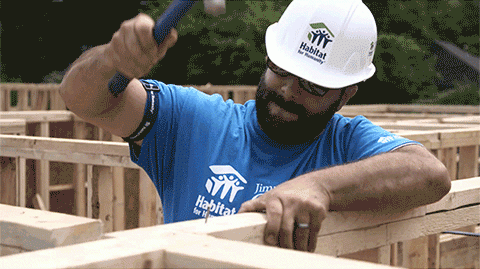 Carter Work Project 2016 volunteer hammering