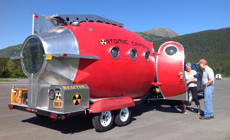 Red rocket-shaped camper van