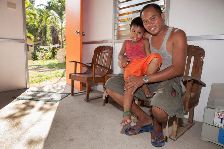 Marlito Sarda and son in their Habitat house