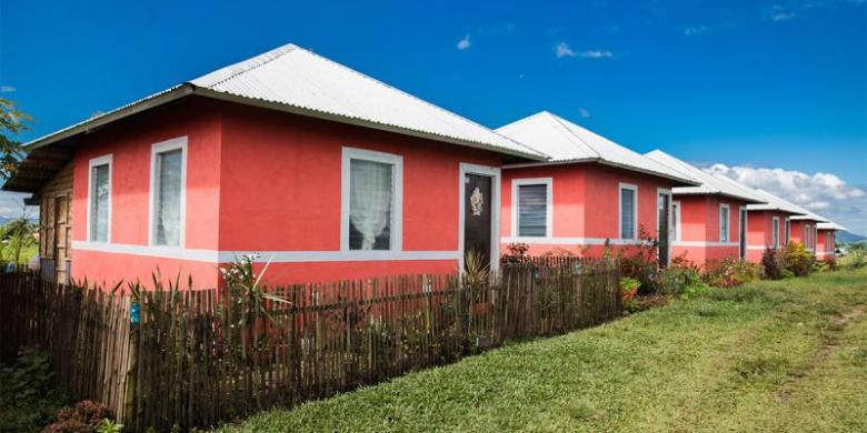 a row of pink houses in Philippines