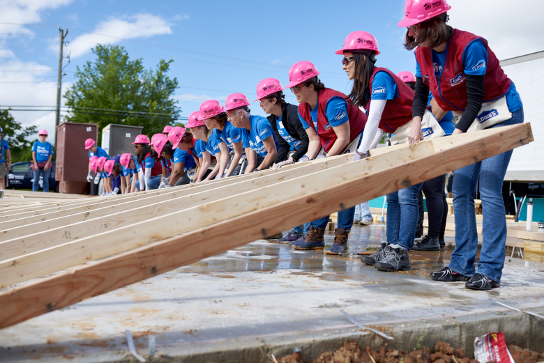 Women raising a wall