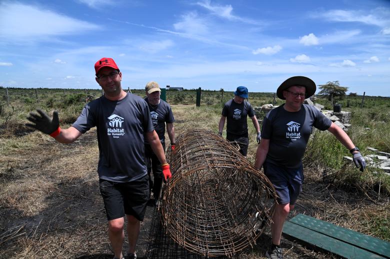 Volunteers engaging in the build