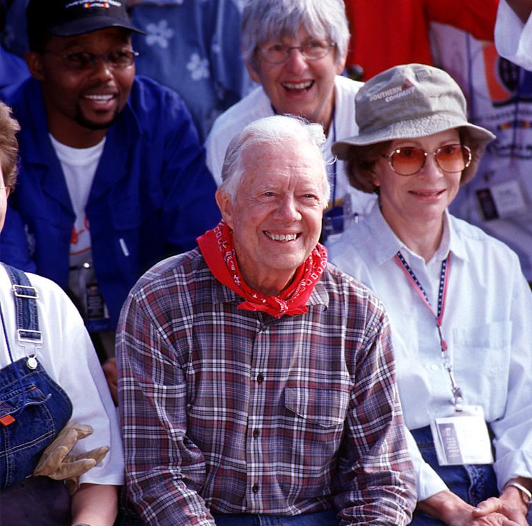 President and Mrs. Carter on a Habitat build site