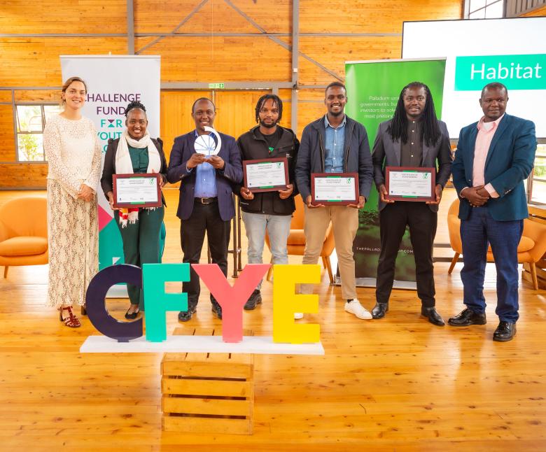 Africa Finance Assistant Valerie Kizito (second from left) and Masua Mutua, Regional Director for Eastern and Southern Africa at the Terwilliger Center for Innovation in Shelter (third from left), pictured with partners at the meeting